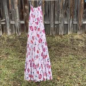 Maxi dress with tie-straps and floral pattern.
